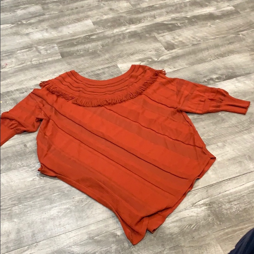 Beautiful orange sweater too